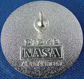 This pin is made by AB Emblems, the NASA Contractor for mission