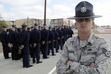 Instructor (TI) at Lackland in 2009. RH&T dormitories in background