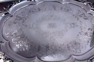 copper tray/waiter. Its in a roccoco style with shell and scroll rim