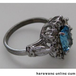 Ring mit Zirkonia + blauem Farbstein Silber .800 / Gr. 54 / D 17