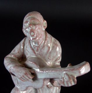 antike Keramikfigur   Der Musikant   signiert