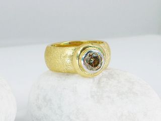 Ring in 900/  Gelbgold mit einem Brillanten ca. 0,72 ct. 