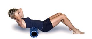 Roll from just above your hips to just below your lower ribs. If you
